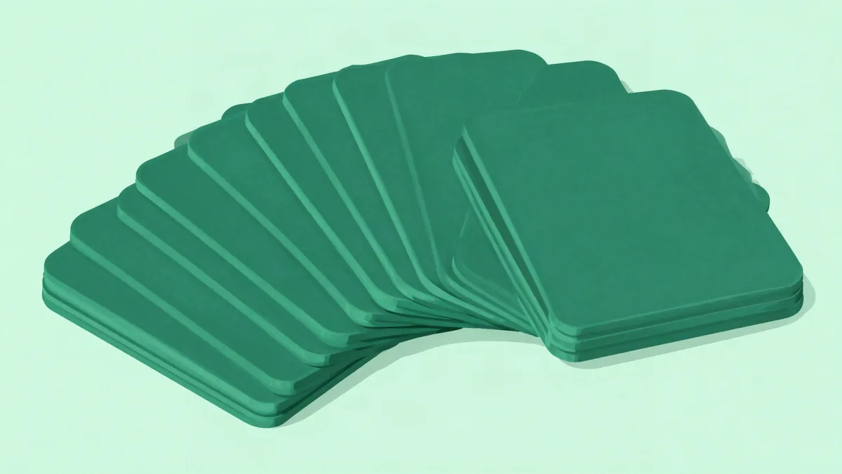 Flat illustration of a stack of plain green rounded tiles fanned into a smooth curve and split into two interleaved piles, on a light mint background