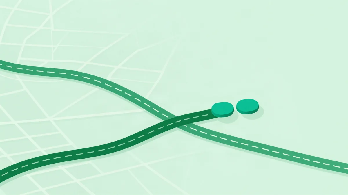 Flat editorial illustration of a winding road ribbon in two shades of green crossing a simplified map of city blocks, with two small rounded markers beside it